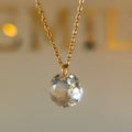 Collier pampille cristal facetté, chaîne dorée en acier inoxydable