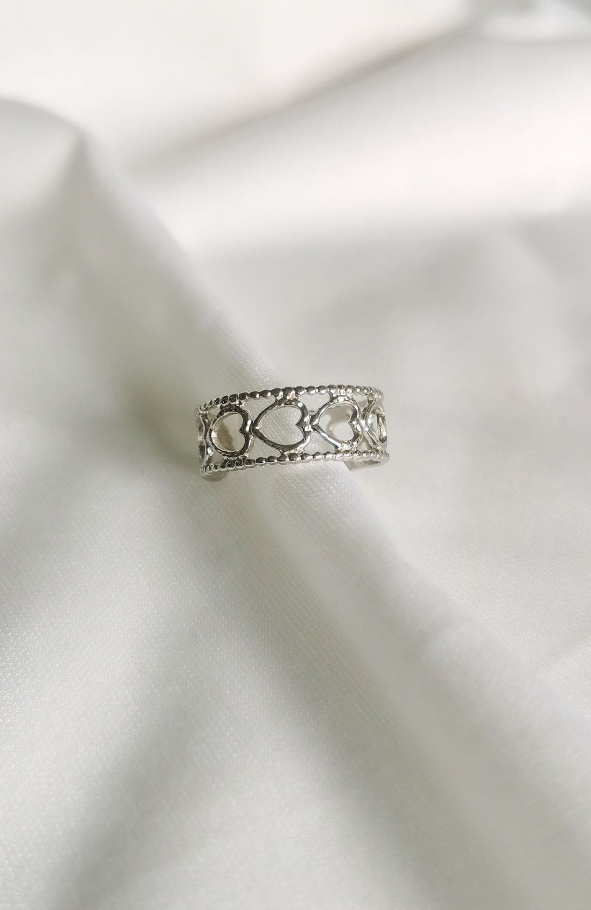 Bague Camberra argentée à motifs de cœurs ajourés, acier inoxydable - Emilya Bijoux