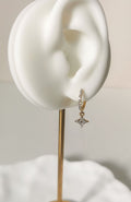 Boucles d'oreilles Hazel dorées en acier inoxydable, créole scintillante avec pendentif étoile