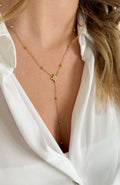 Collier lariat étoile recouverte d'éclats de zircons en acier inoxydable doré, porté au cou