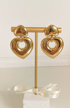 Boucles d'oreilles Estelle dorées en acier inoxydable, puce cœur