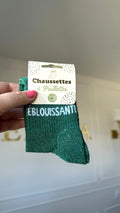 Chaussette à paillettes verte avec inscription "Éblouissante"