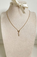 Collier Eve doré - pendentif fleur recouvert d'éclats de zircons sur chaîne fine
